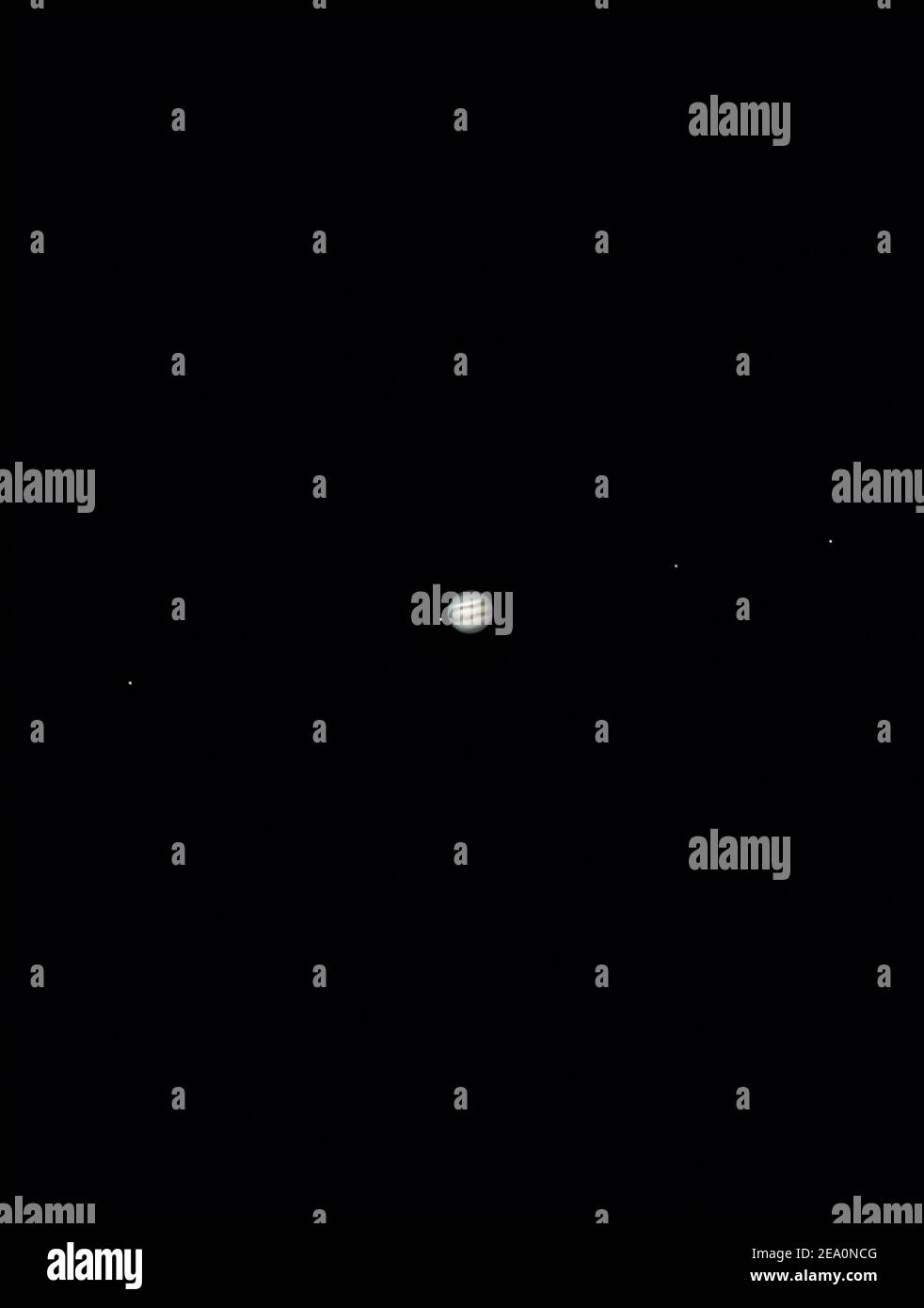 Planet Jupiter as seen from an advanced amateur telescope from a city sky at Santiago de Chile. Jupiter, the Giant Gas Planet show us its belts and sp Stock Photo