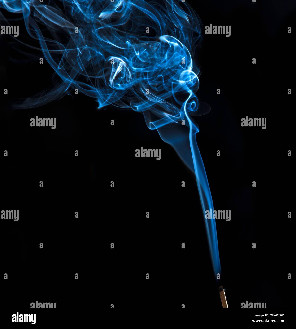 Smoke from an incense stick Stock Photo