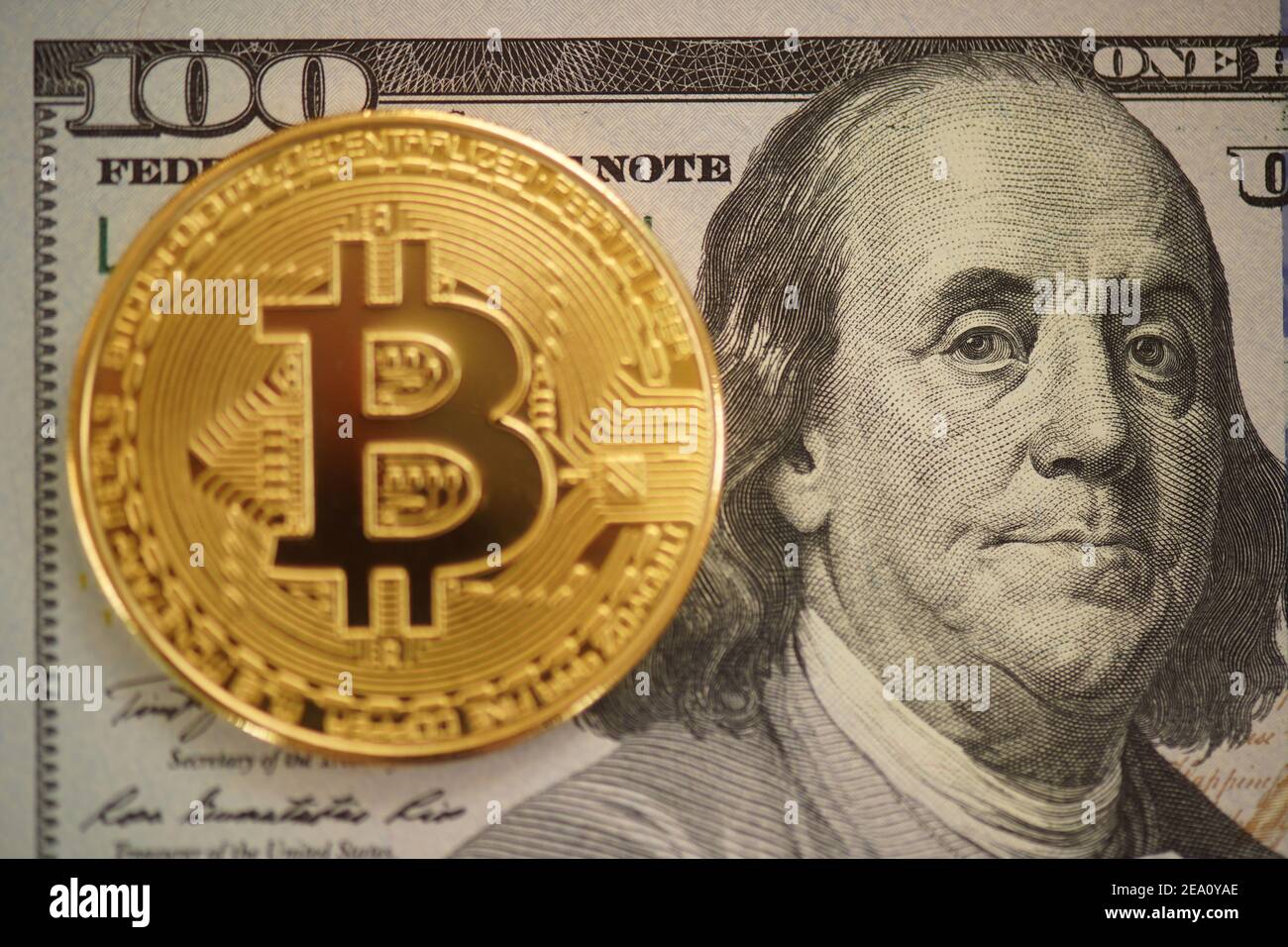 Bitcoin digital crypto currency logo with dollar bil Stock Photo Alamy