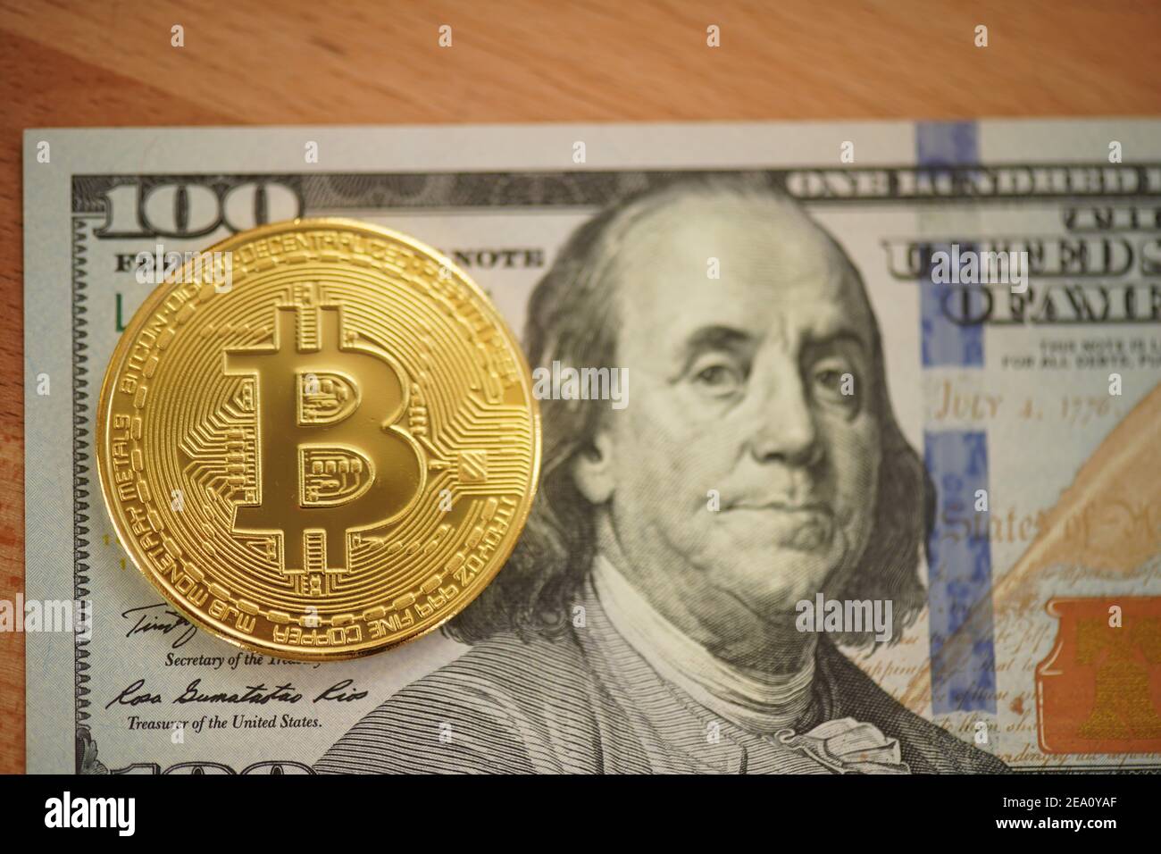 Bitcoin digital crypto currency logo with dollar bil Stock Photo Alamy