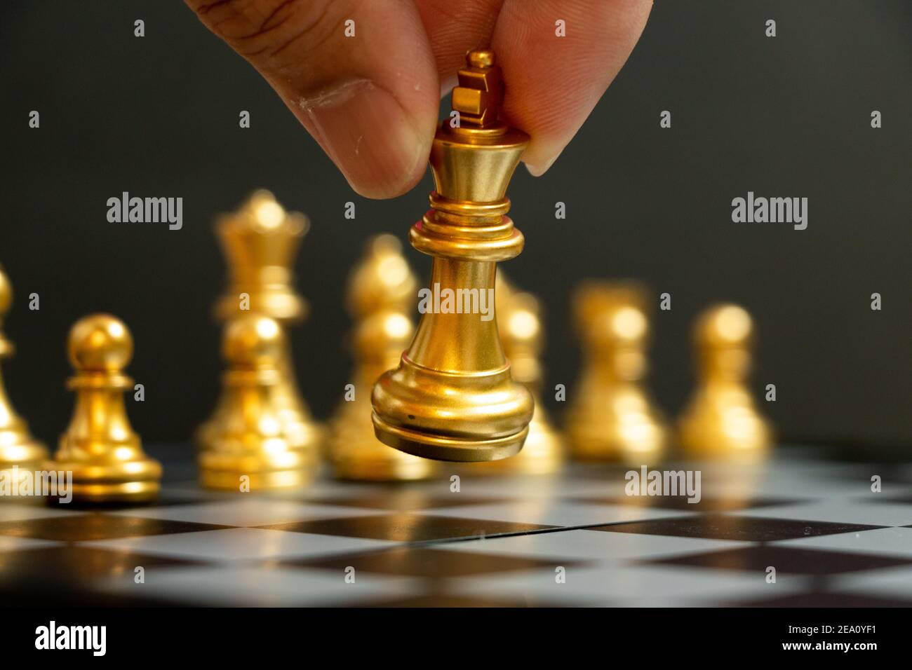 Key Strategy Person Playing Chess And Taking Next Move