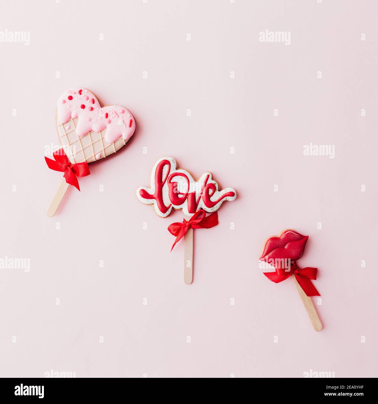 Gingerbread cookies love, lips, heart ice cream. Valentine card. Pink background Stock Photo