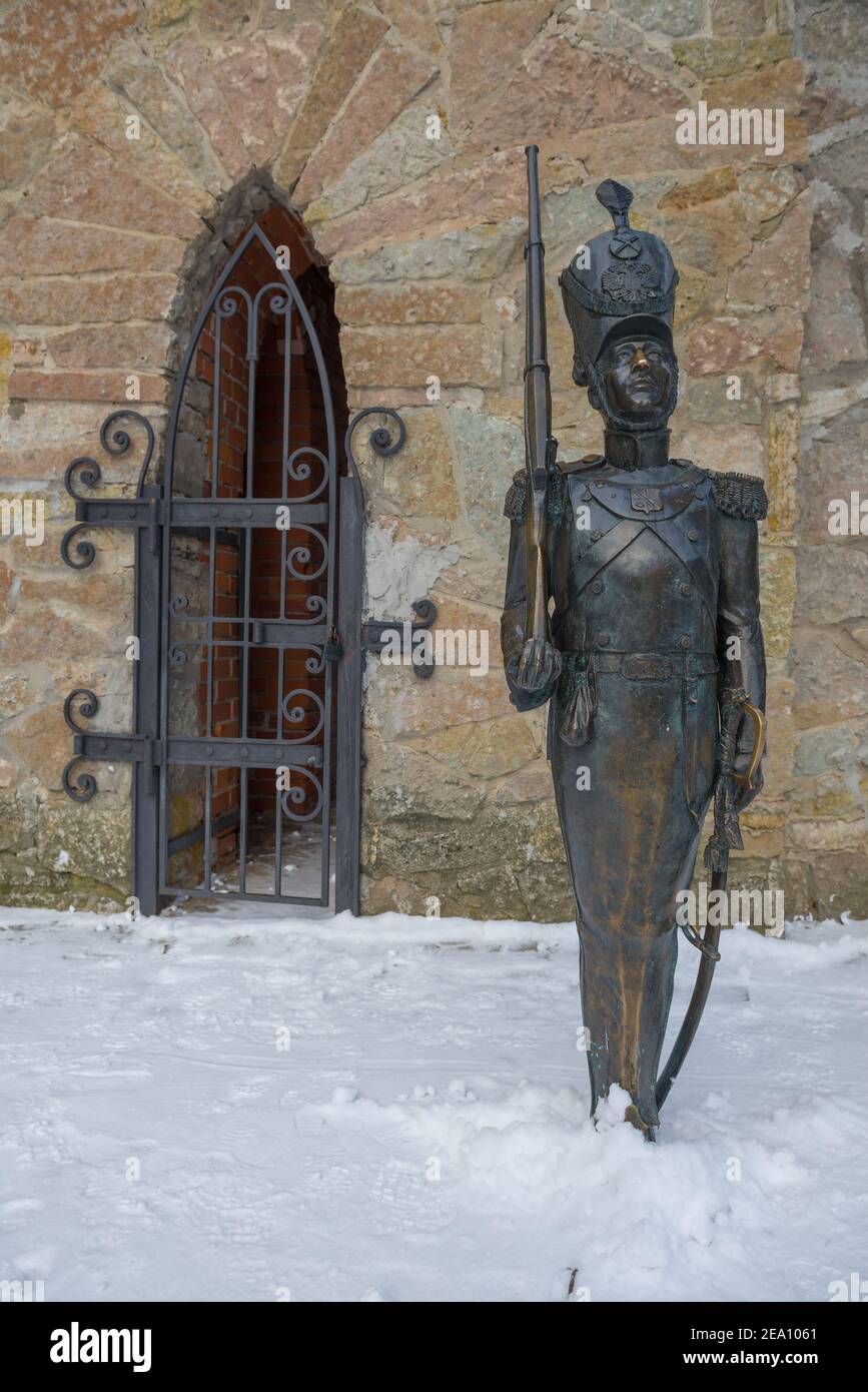 SOSNOVY BOR, RUSSIA - FEBRUARY 01, 2021: Sculpture of a tin soldier on a winter day. Fragment of the children's town Andersengrad. Sosnovy Bor Stock Photo