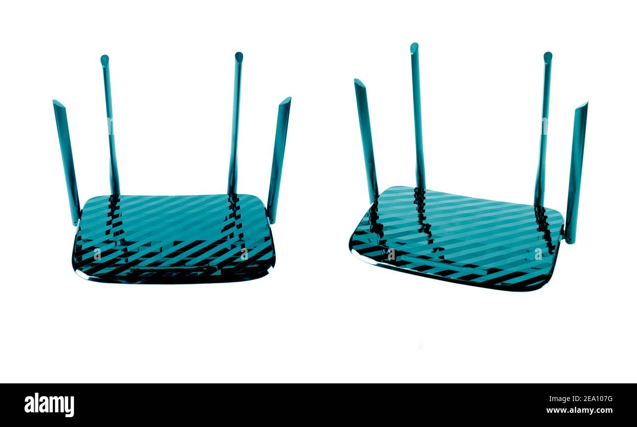Two wireless Wi-Fi router isolated on white background with clipping ...