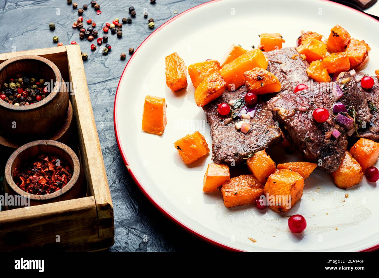 Veal stewed with pumpkin and cranberry sauce Stock Photo Alamy
