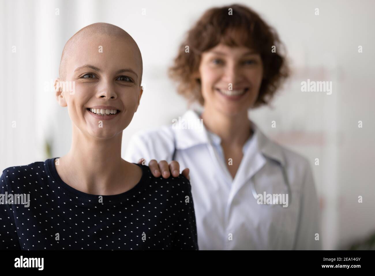 Portrait of doctor help female patient beat cancer Stock Photo