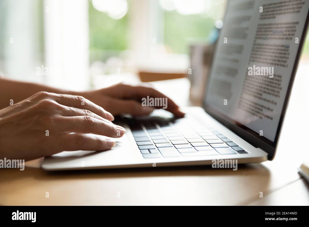 Woman typing on keyboard laptop hi-res stock photography and images - Alamy