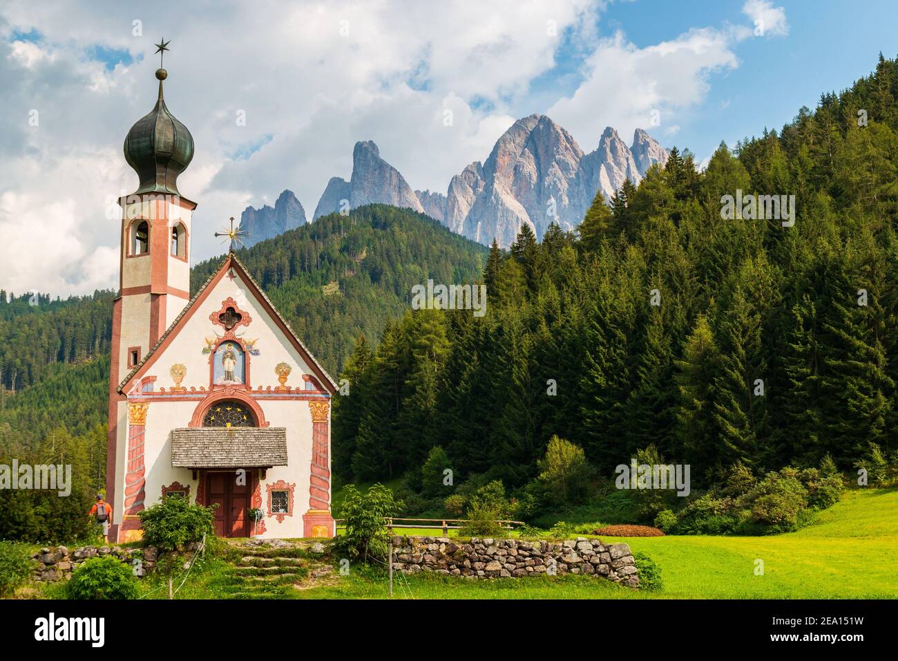 The world famous church in the prairie, San Giovanni in Ranui in Santa Maddalena of the Funes Valley, Trentino Alto Adige, Italy Stock Photo