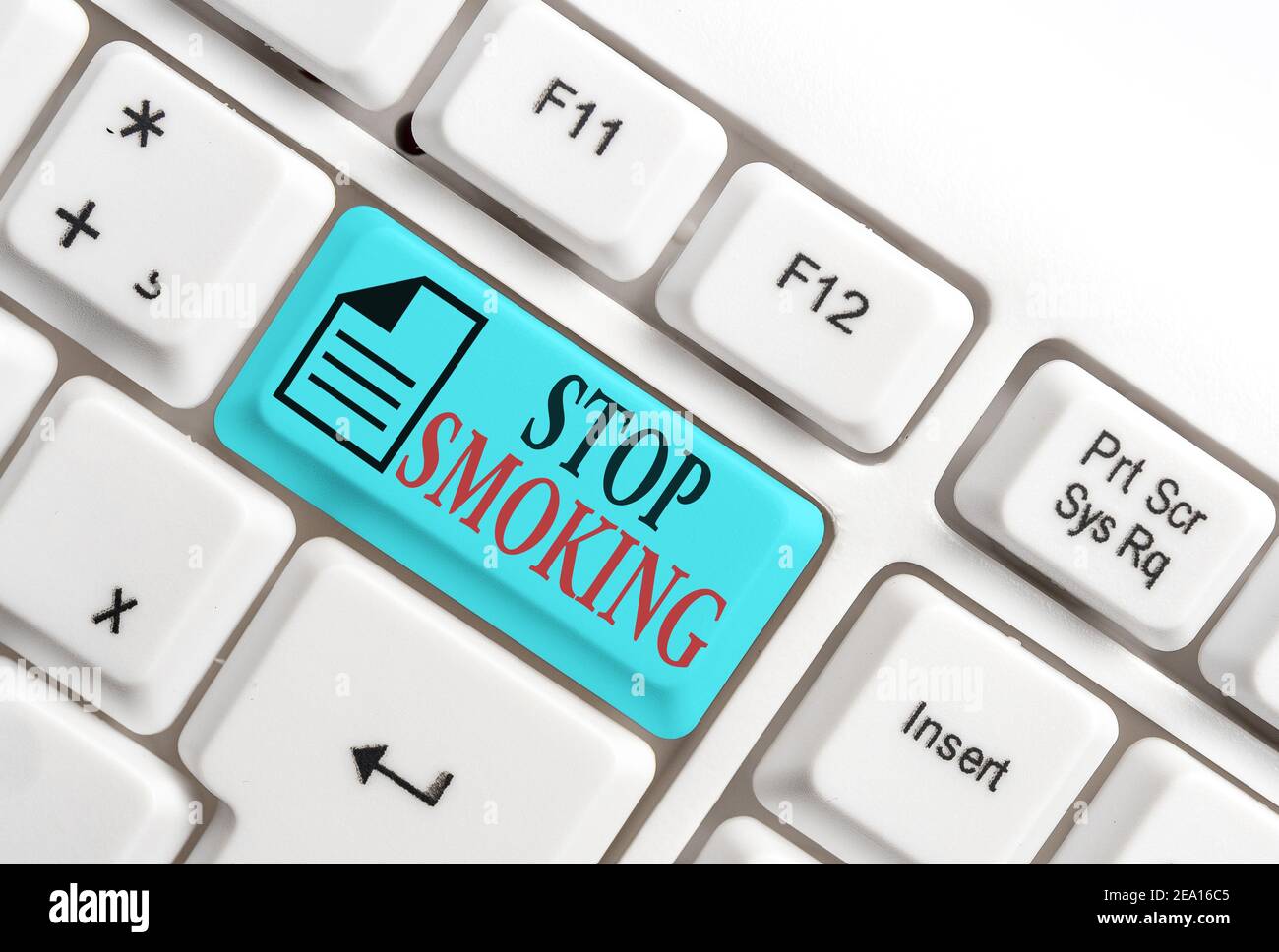 Word writing text Stop Smoking. Business photo showcasing the process of discontinuing or quitting tobacco smoking Different colored keyboard key with Stock Photo