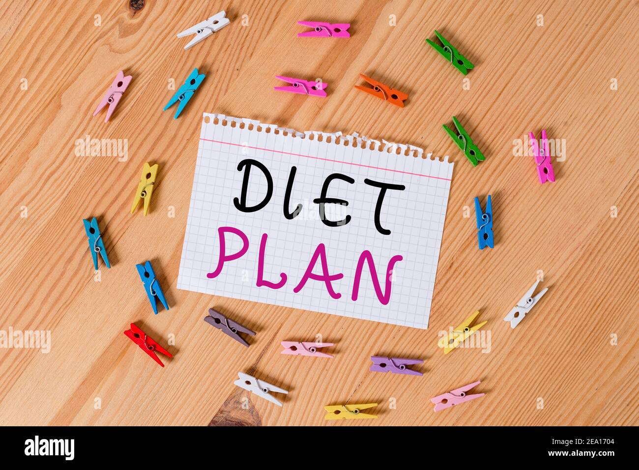 Conceptual hand writing showing Diet Plan. Concept meaning amount of food are planned out to achieve a specific weight Colored crumpled papers wooden Stock Photo