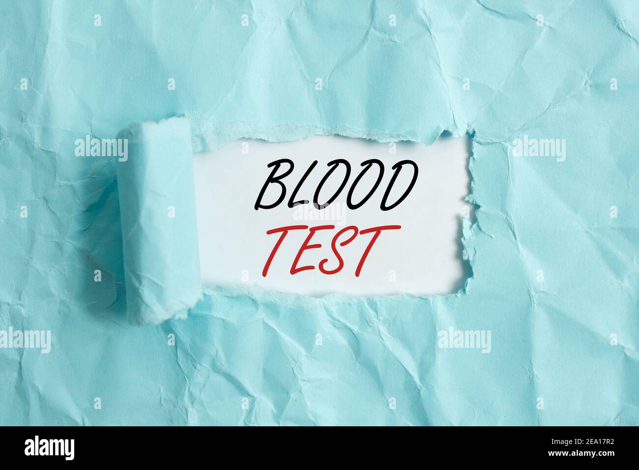 Text sign showing Blood Test. Business photo showcasing Extracted blood sample from an organism to perfom a laboratory analysis Rolled ripped torn car Stock Photo