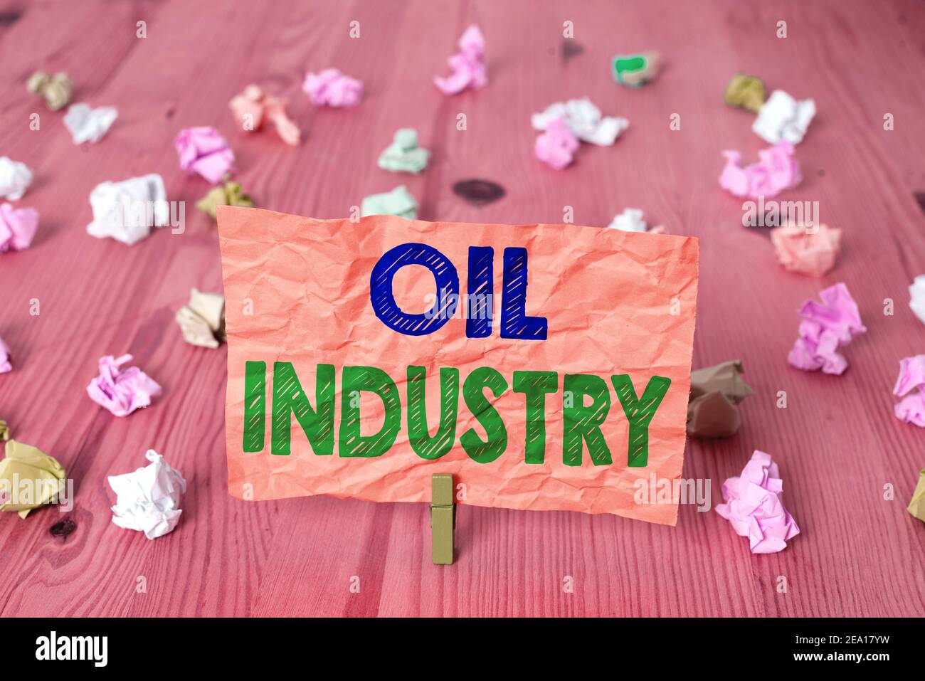 Writing note showing Oil Industry. Business concept for Exploration Extraction Refining Marketing petroleum products Colored crumpled rectangle shaped Stock Photo
