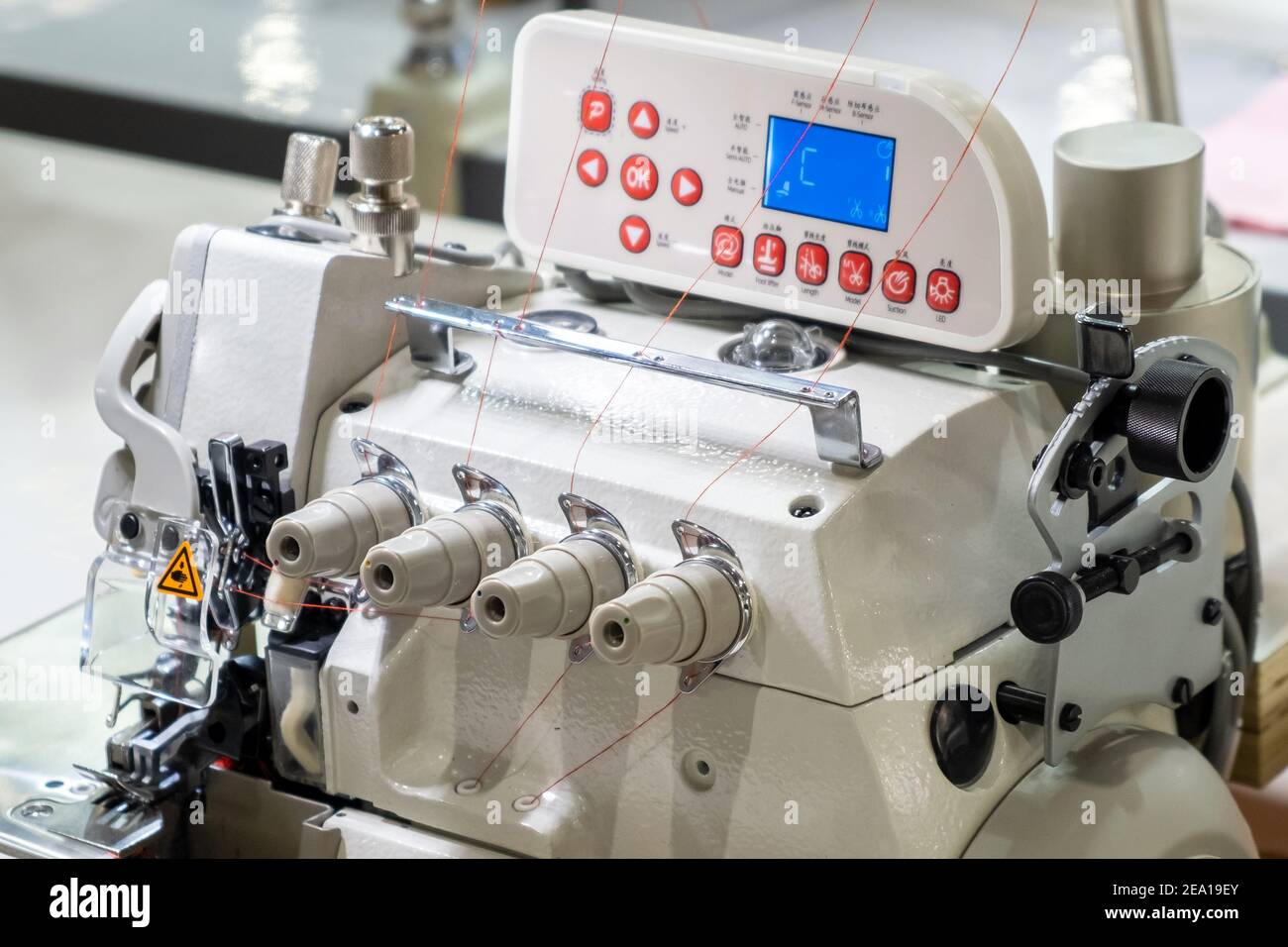 Panel Control Sewing Machine Close-up of details of modern white professional electric sewing ...