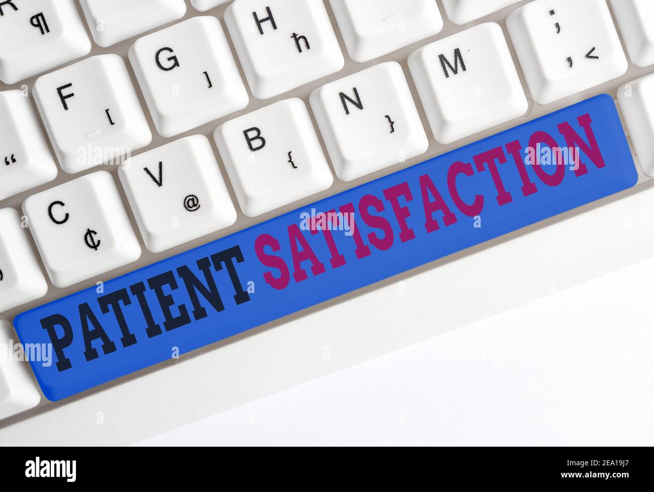 Handwriting text Patient Satisfaction. Conceptual photo the extent to which a patient is happy with their healthcare Different colored keyboard key wi Stock Photo