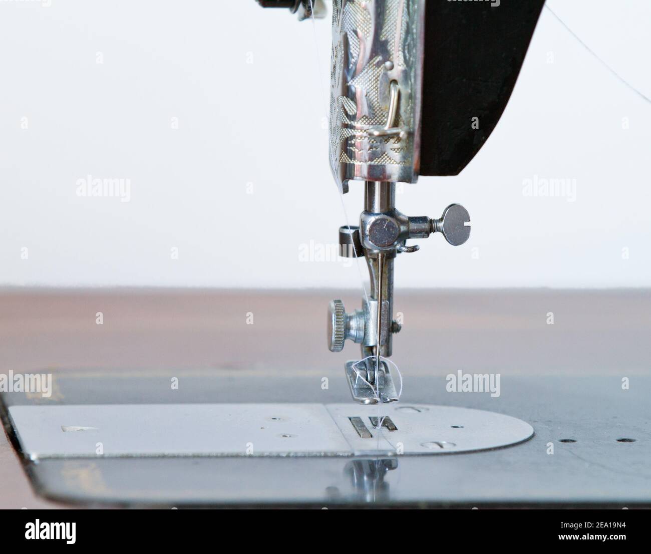 Antique sewing machine needle Stock Photo Alamy