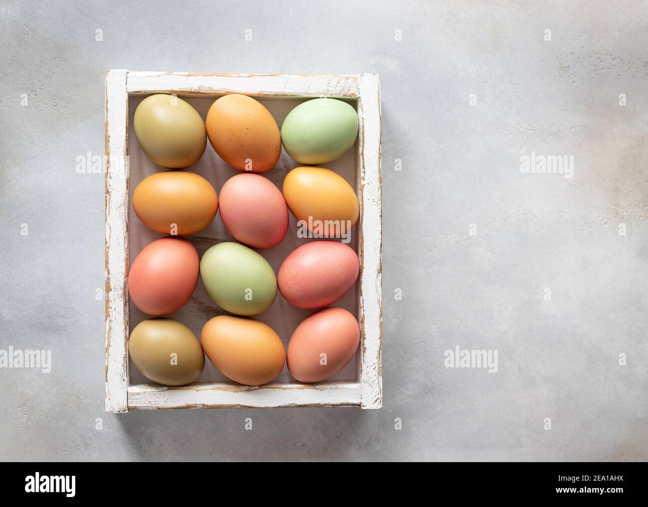 flat lay composition with Easter eggs in white wooden box Stock Photo ...