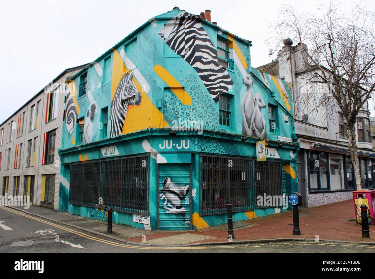 Wall art in Brighton England with meerkats and zebras with no people