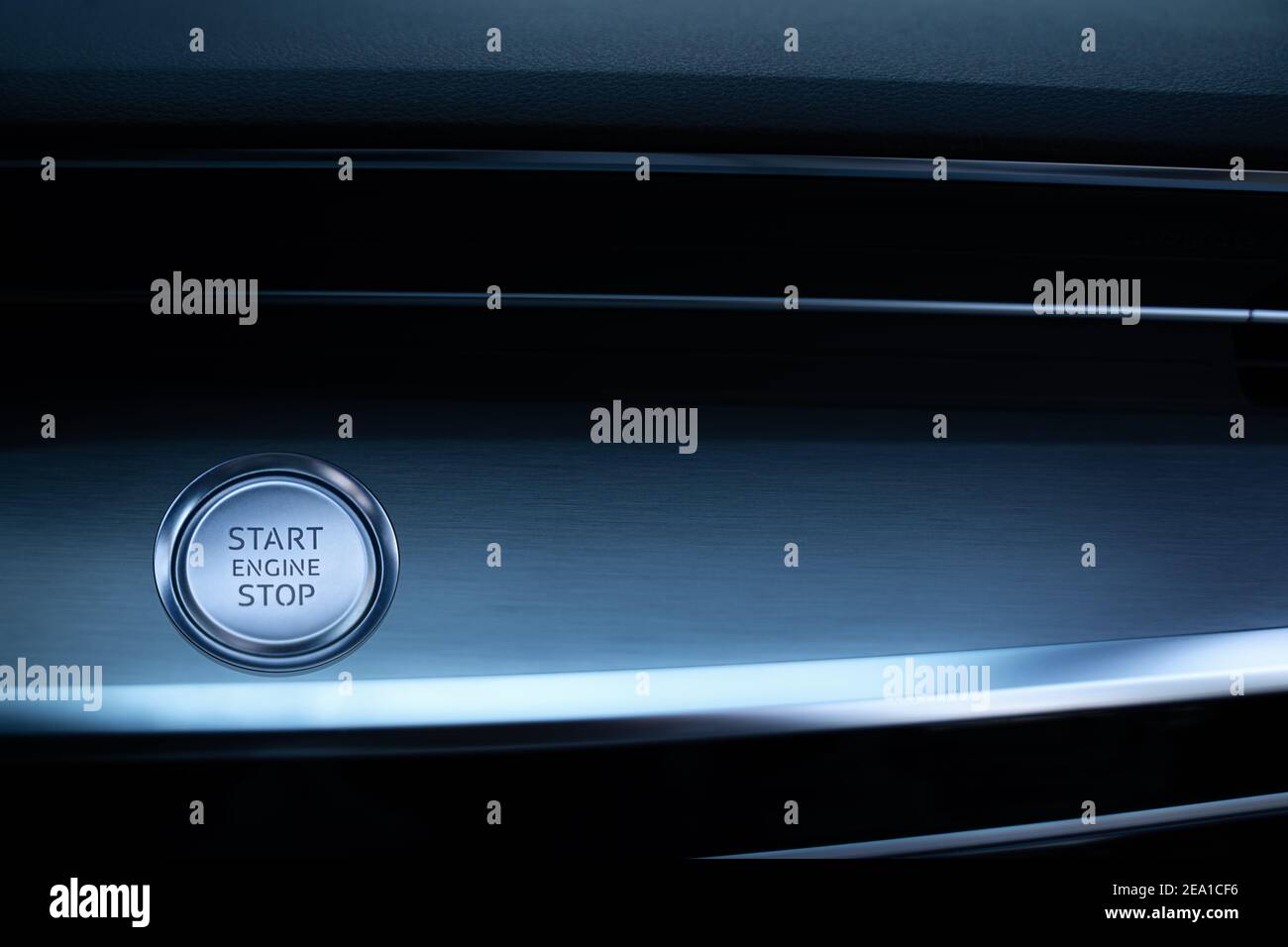 Engine start stop button. Car driver starting the engine. Stock Photo
