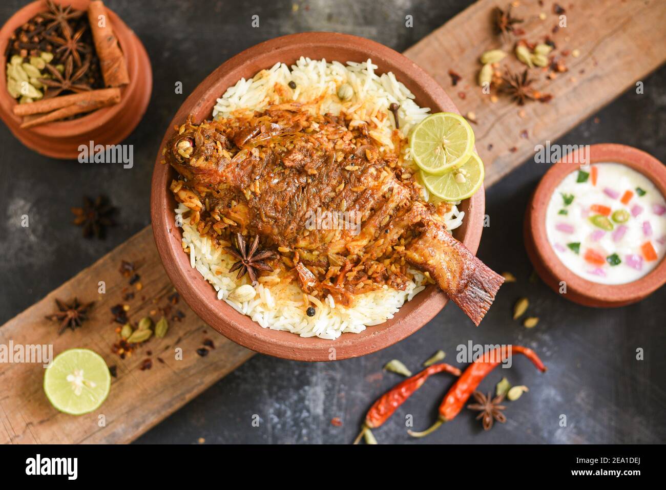 Fish biryani. Spicy Indian Malabar biryani or Hydrabadi biryani, Dum