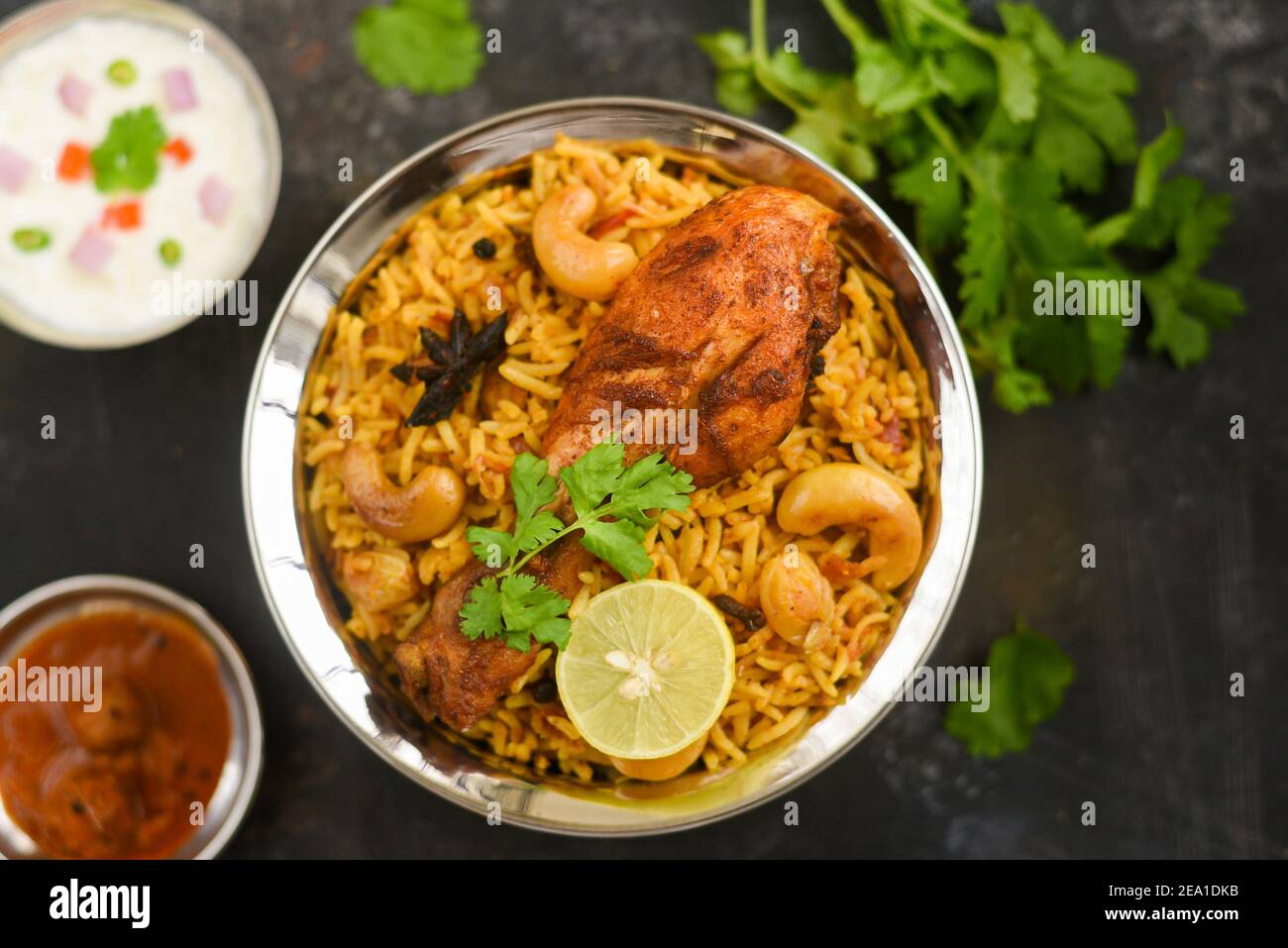 Chicken biryani. Spicy Indian Malabar biryani or Hydrabadi biryani, Dum Biriyani, fish and rice