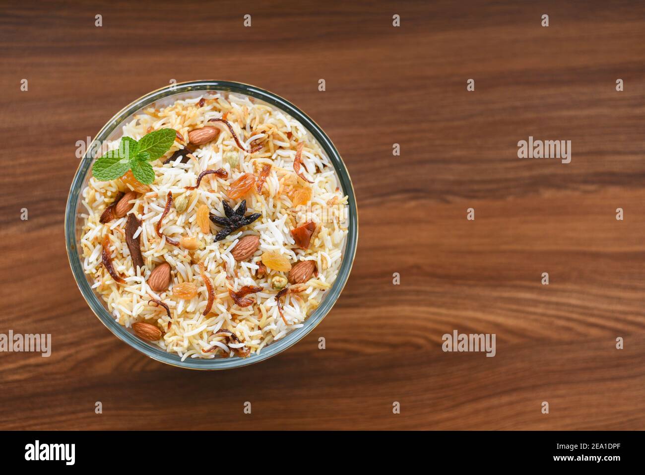 Chicken biryani. Spicy Indian Malabar biryani or Hydrabadi biryani, Dum Biriyani, fish and rice