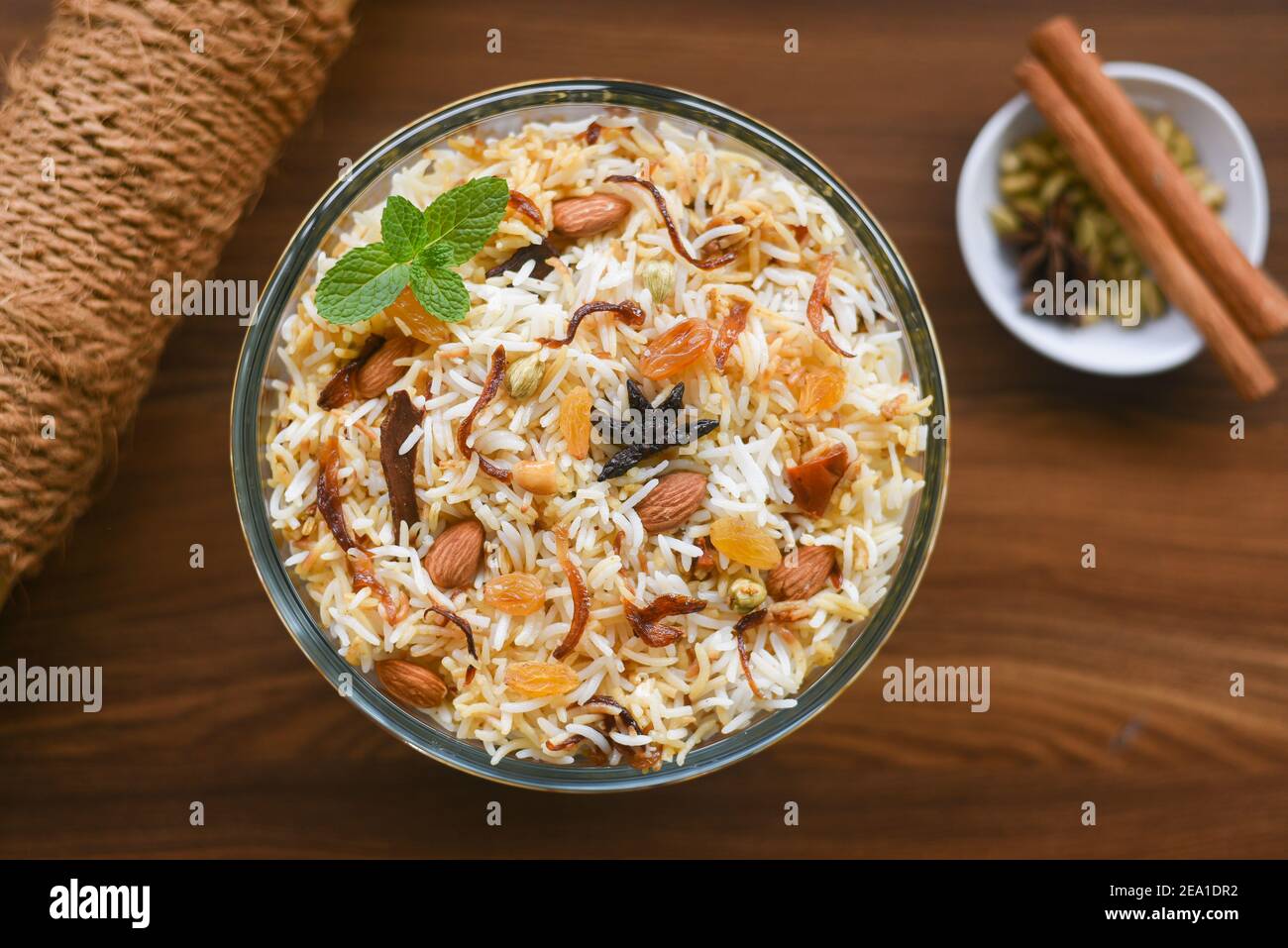 Chicken biryani. Spicy Indian Malabar biryani or Hydrabadi biryani, Dum Biriyani, fish and rice