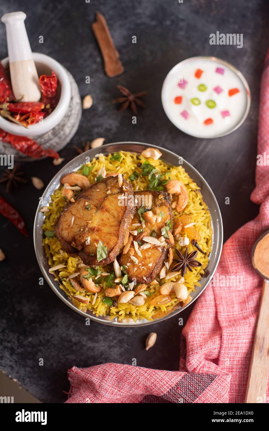 Fish biryani. Spicy Indian Malabar biryani or Hydrabadi biryani, Dum
