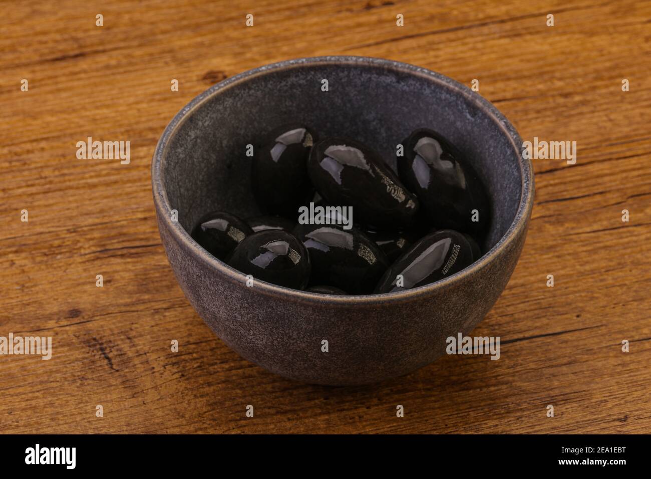 Pickled tasty black olives in the bowl Stock Photo Alamy