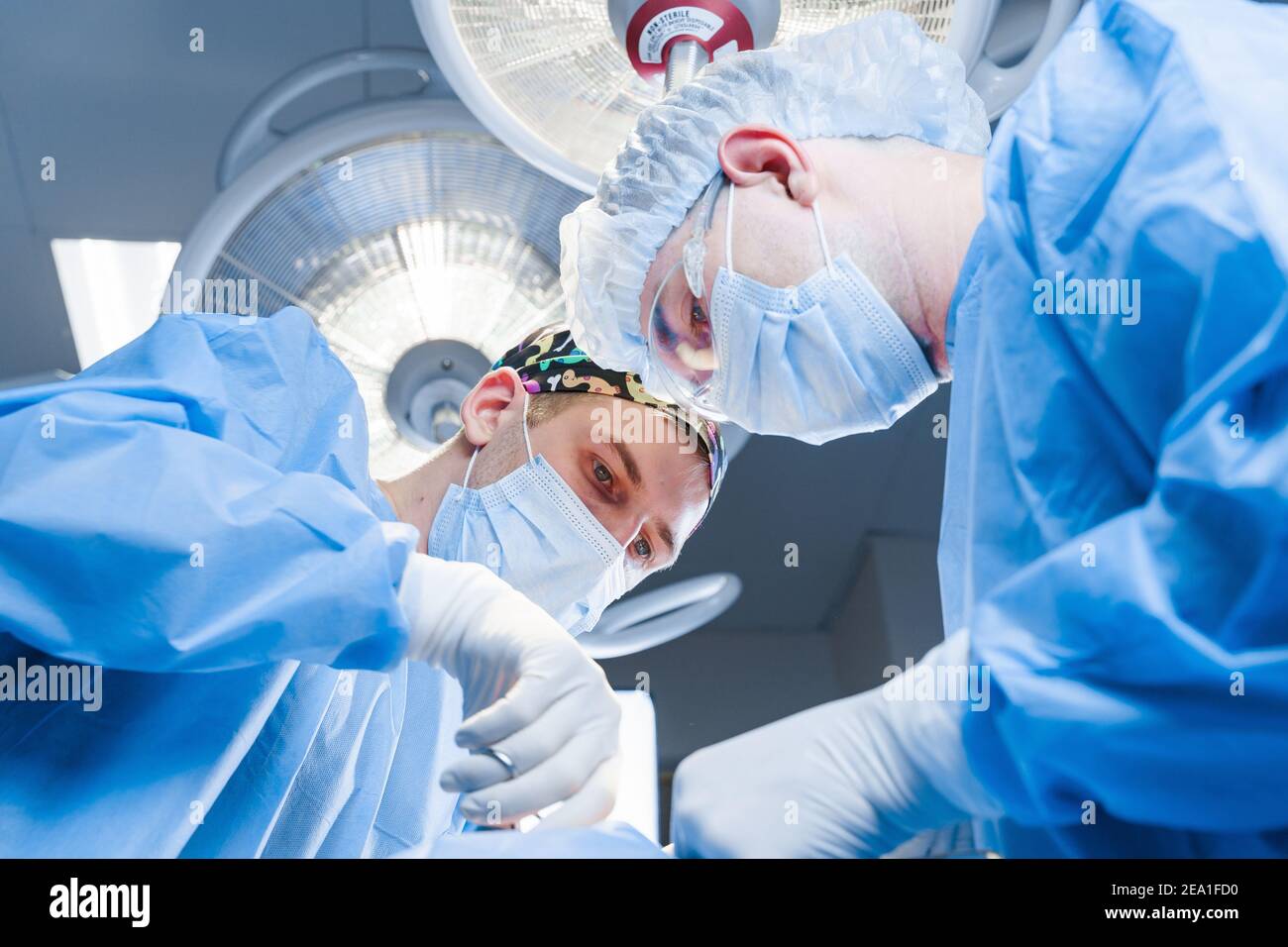 Surgeons do plastic operation in medical clinic. Surgery. Professional
