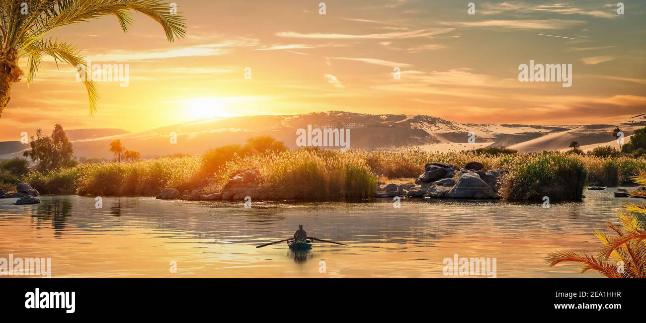View of the Great Nile in Aswan at sunset Stock Photo