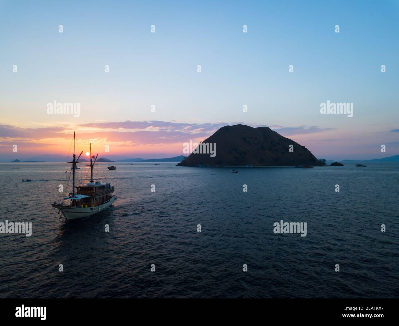 Sunset in Komodo national park Island of Pulau Koaba Stock Photo