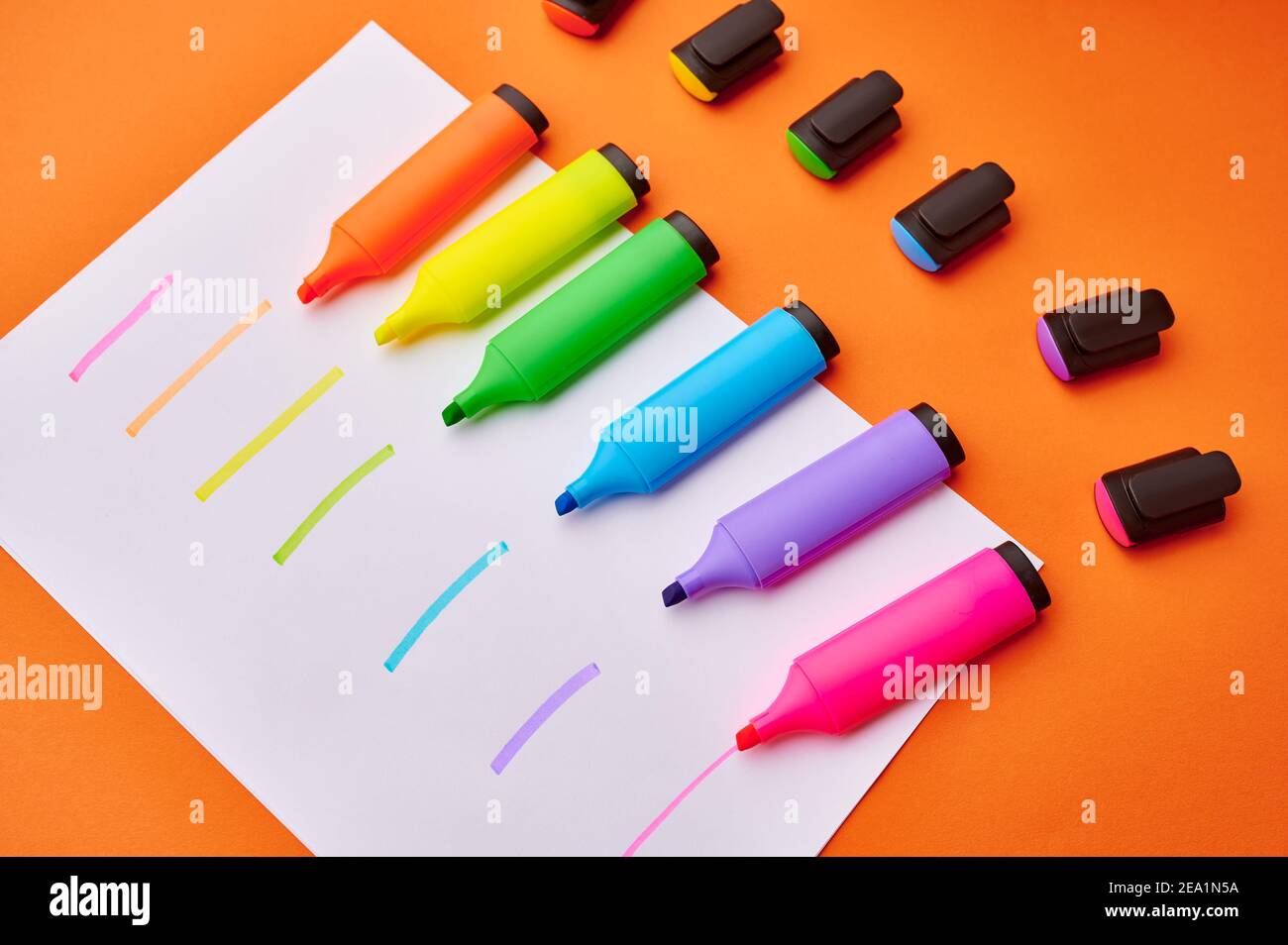 Colorful permanent markers on paper sheet Stock Photo Alamy