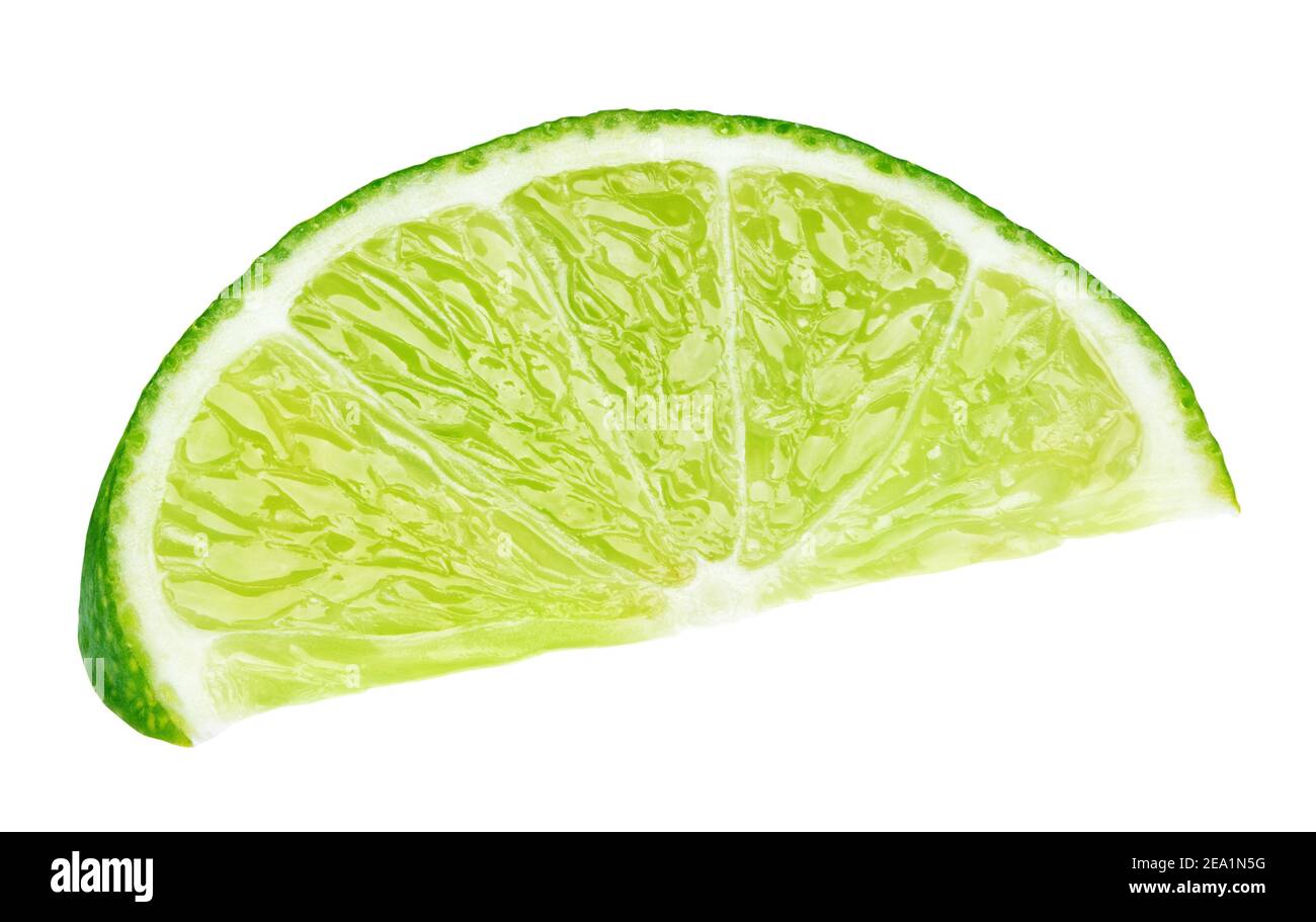 Ripe slice of green lime citrus fruit lying isolated on white ...