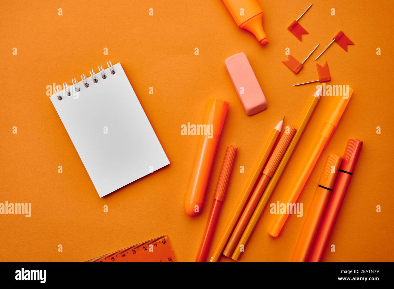 Stationery supplies,macro view, orange background Stock Photo Alamy