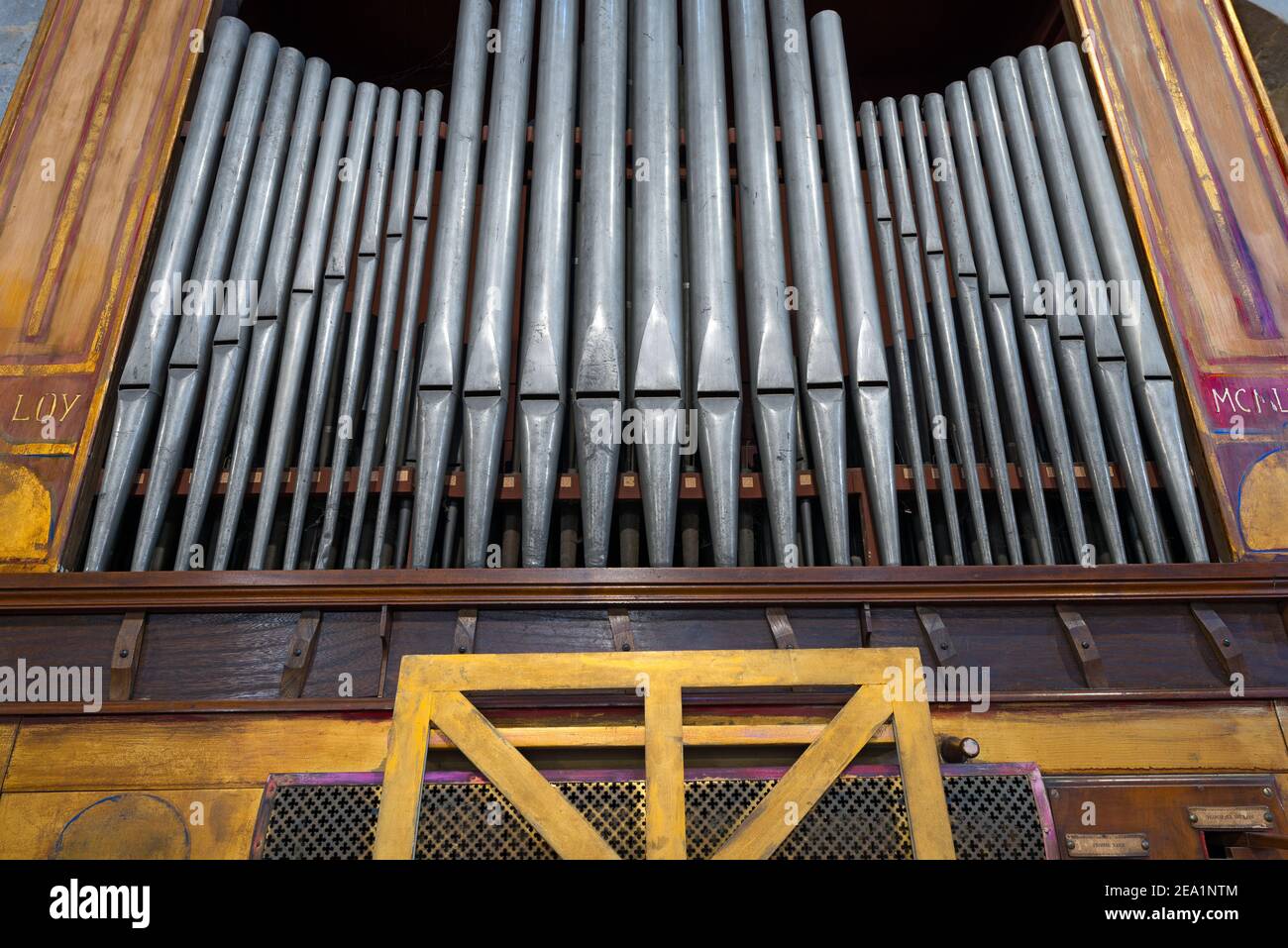 Detail of an ancient pipe organ in an Italian church Stock Photo