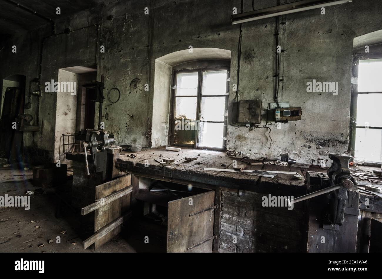 with tables in old factory Stock Photo Alamy