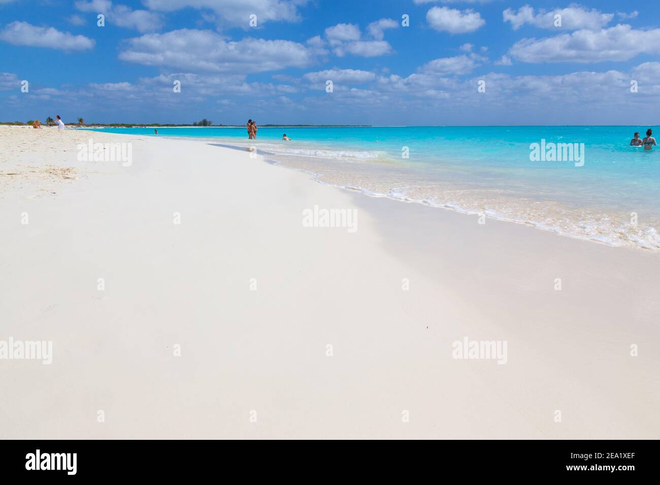 People on the beach. White sand and turquoise sea. Island Cayo Largo ...
