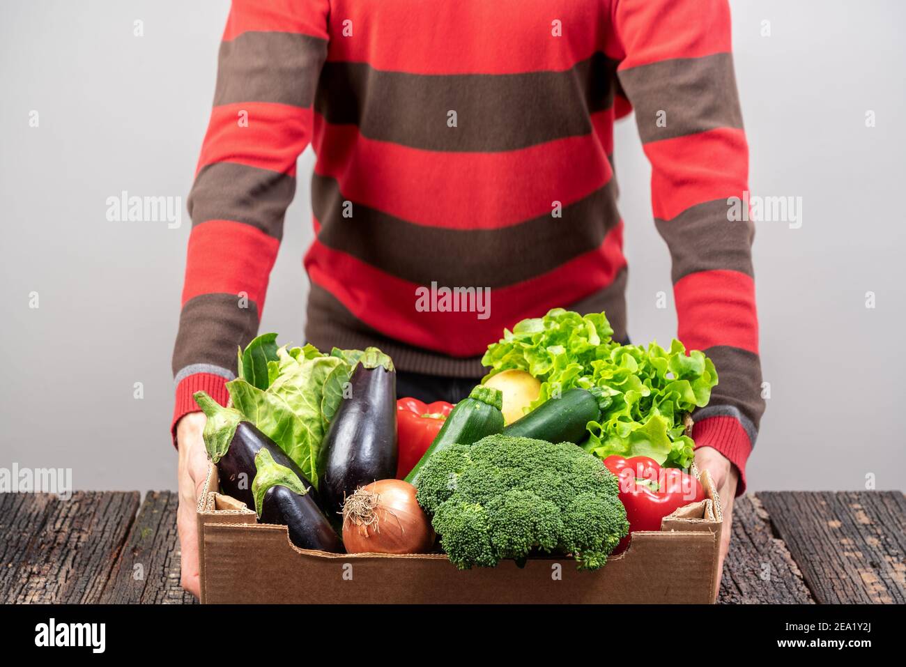 A male volunteer delivers food and vegetables to people in quarantine