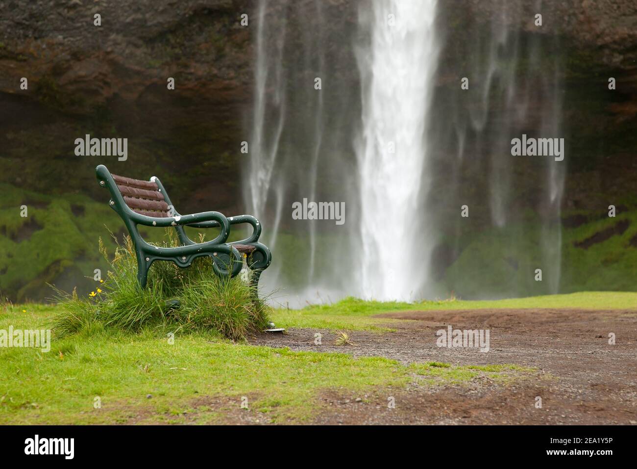 Skogafalls Waterfall Near Against The Backdrop Of Benches In Iceland The Concept Of Calm Relaxation Stock Photo Alamy