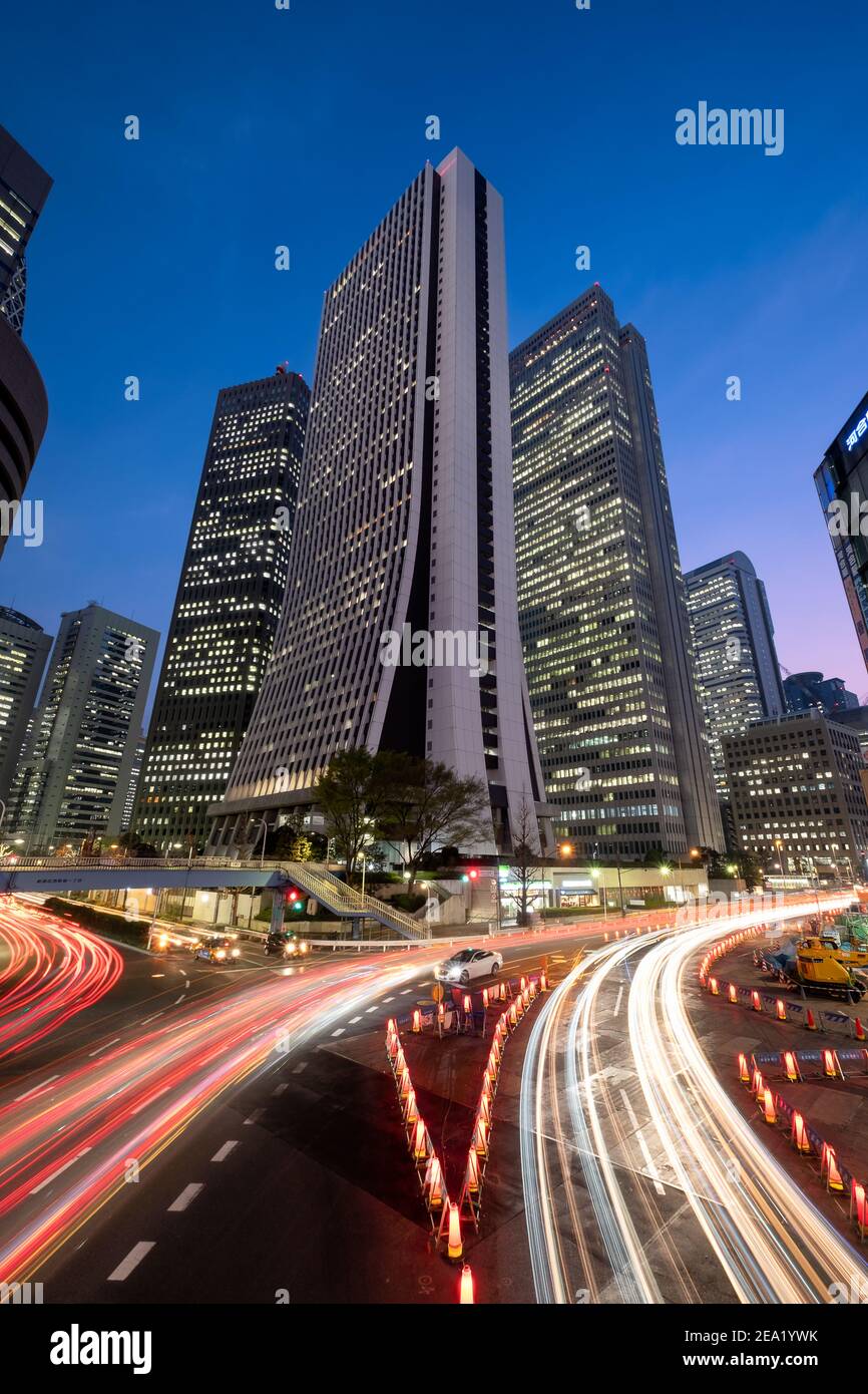 Japan, Tokyo – March 27, 2018: Skyscraper in the Shinjuku district at night. Stock Photo
