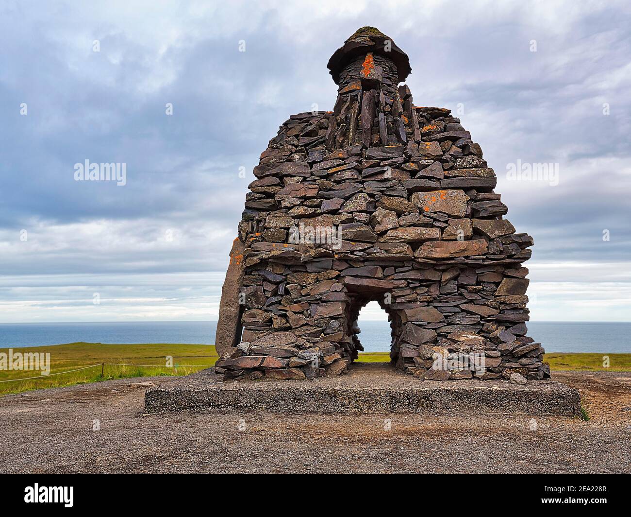 Sculpture of the legendary figure Barour Snaefellsas, artist Ragnar Kjartansson, Arnarstapi, Snaefellsjoekull National Park, Snaefellsnes Stock Photo