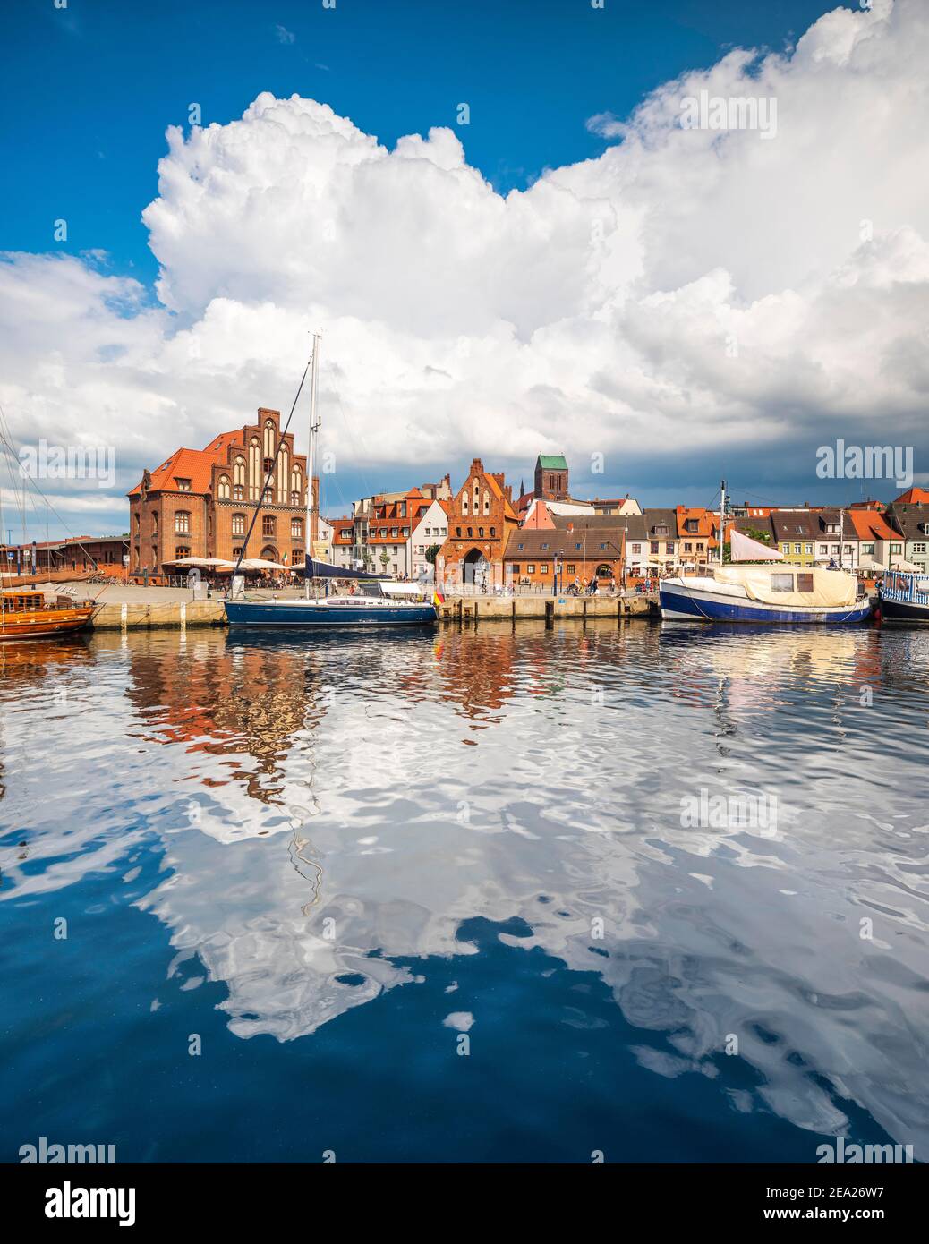 Old harbour with granary, water gate and Nikolai church, approaching thunderstorm, Wismar, Mecklenburg-Western Pomerania, Germany Stock Photo