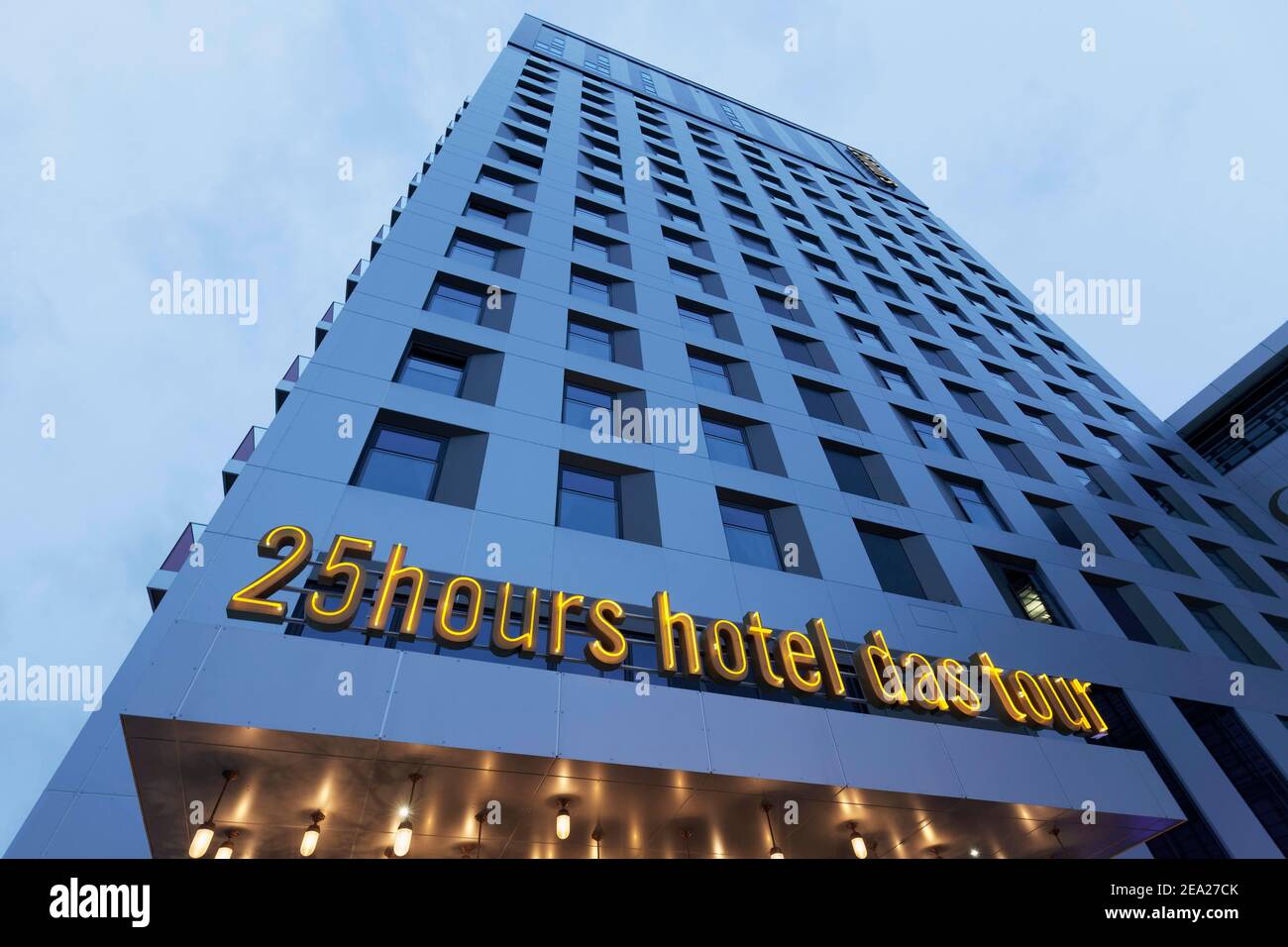 25hours hotel das tour, illuminated lettering on the building, design hotel, Le Quartier Central district, Duesseldorf, North Rhine-Westphalia Stock Photo