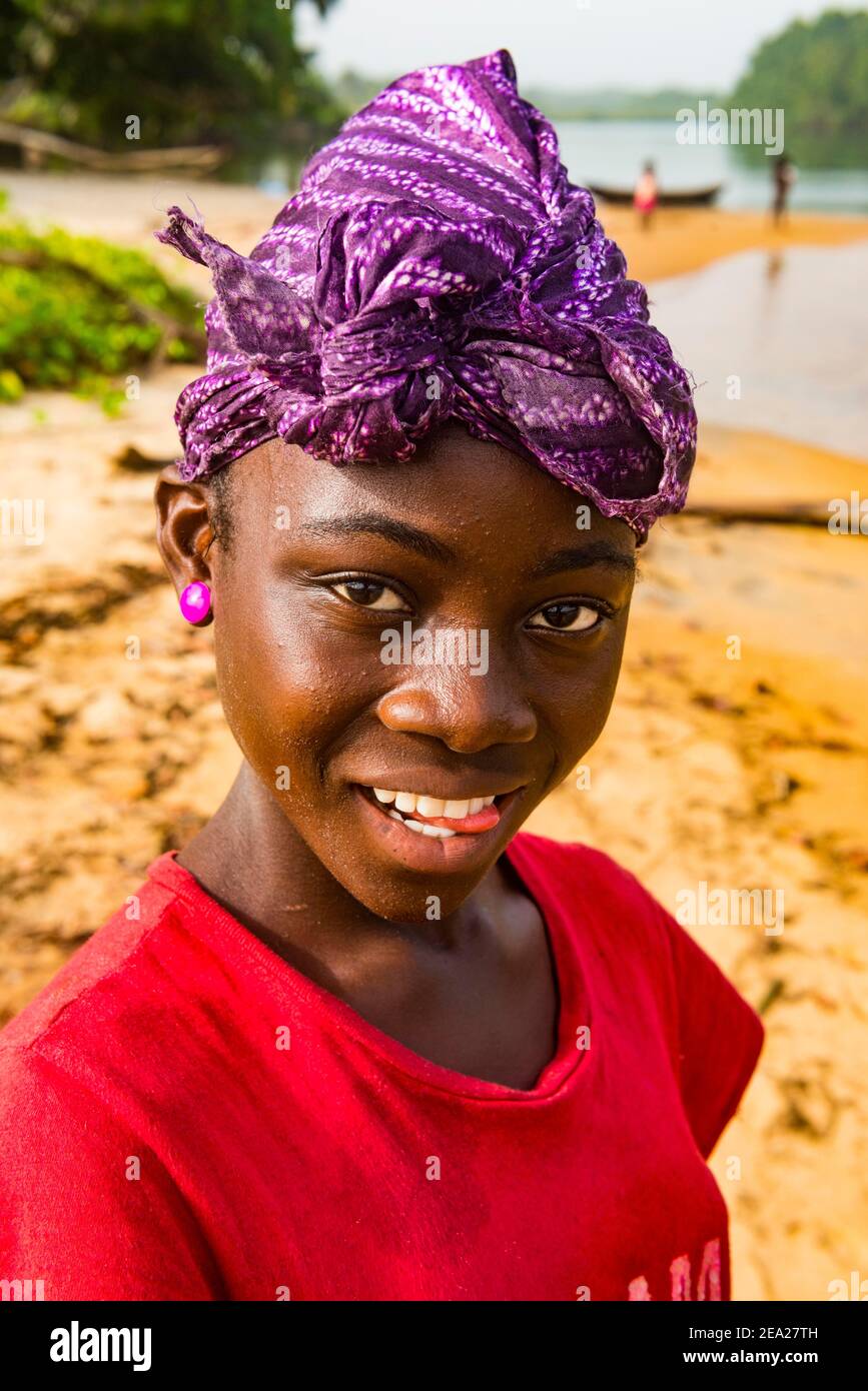Pretty young girl, in a local village, Buchanan, Liberia Stock Photo