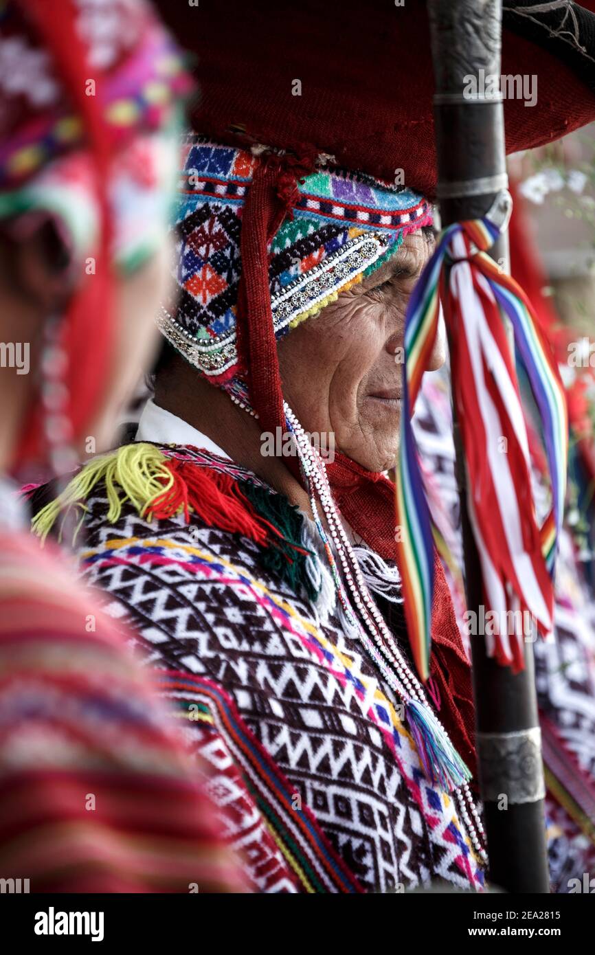 Local Quechua mayor (varayoc) dressed in traditional costume before mass, Pisac Sunday Market, Cusco, Peru Stock Photo