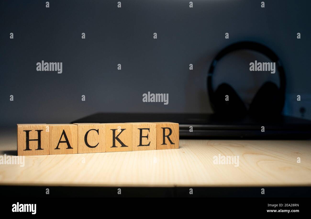 Hacker word on block concept. Close up. Stock Photo