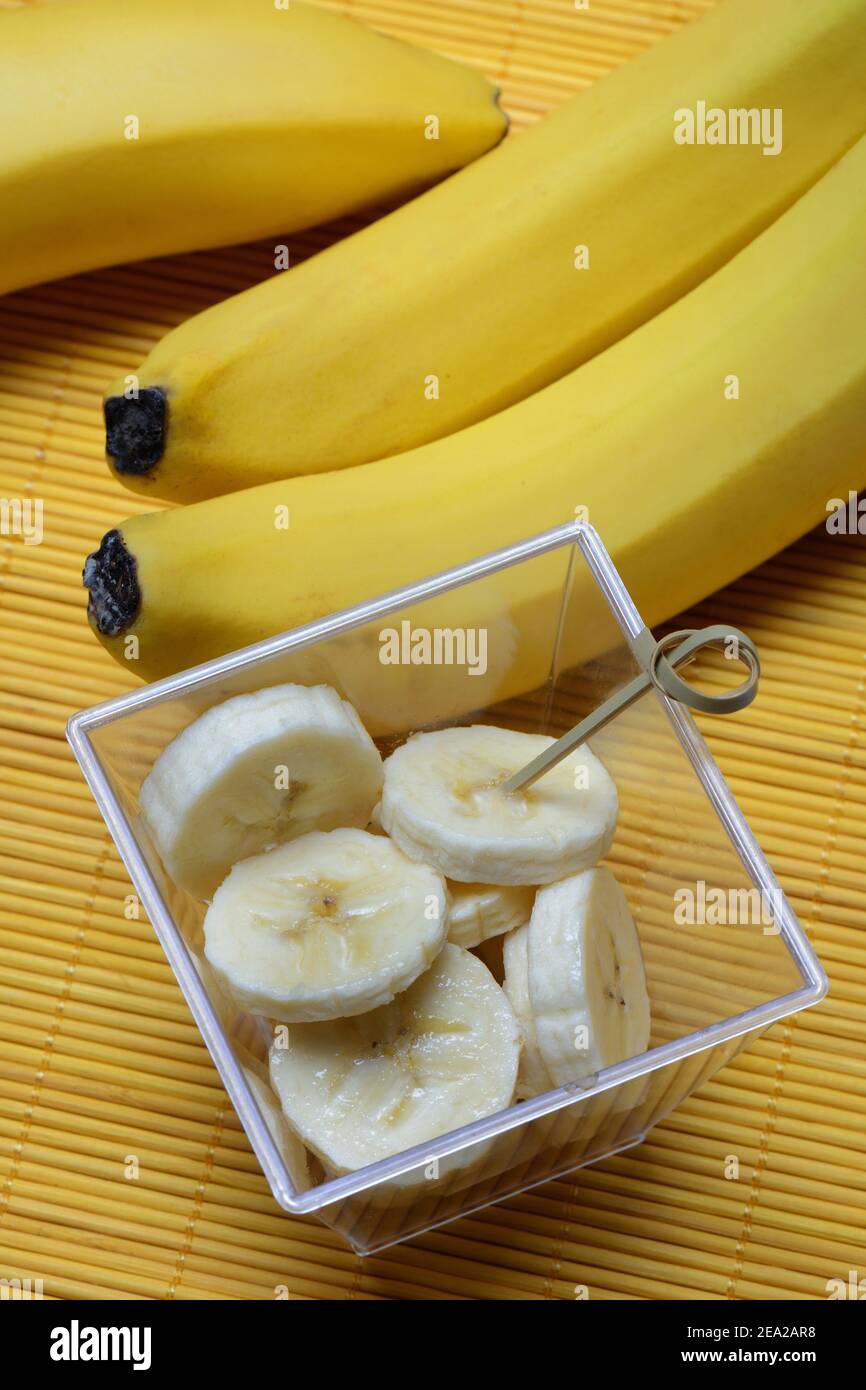 Banana slices in peel and bananas Stock Photo Alamy
