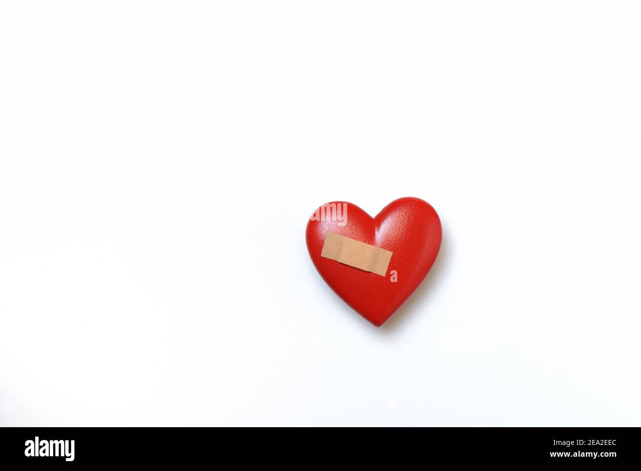 Heart with adhesive plaster, red heart Stock Photo
