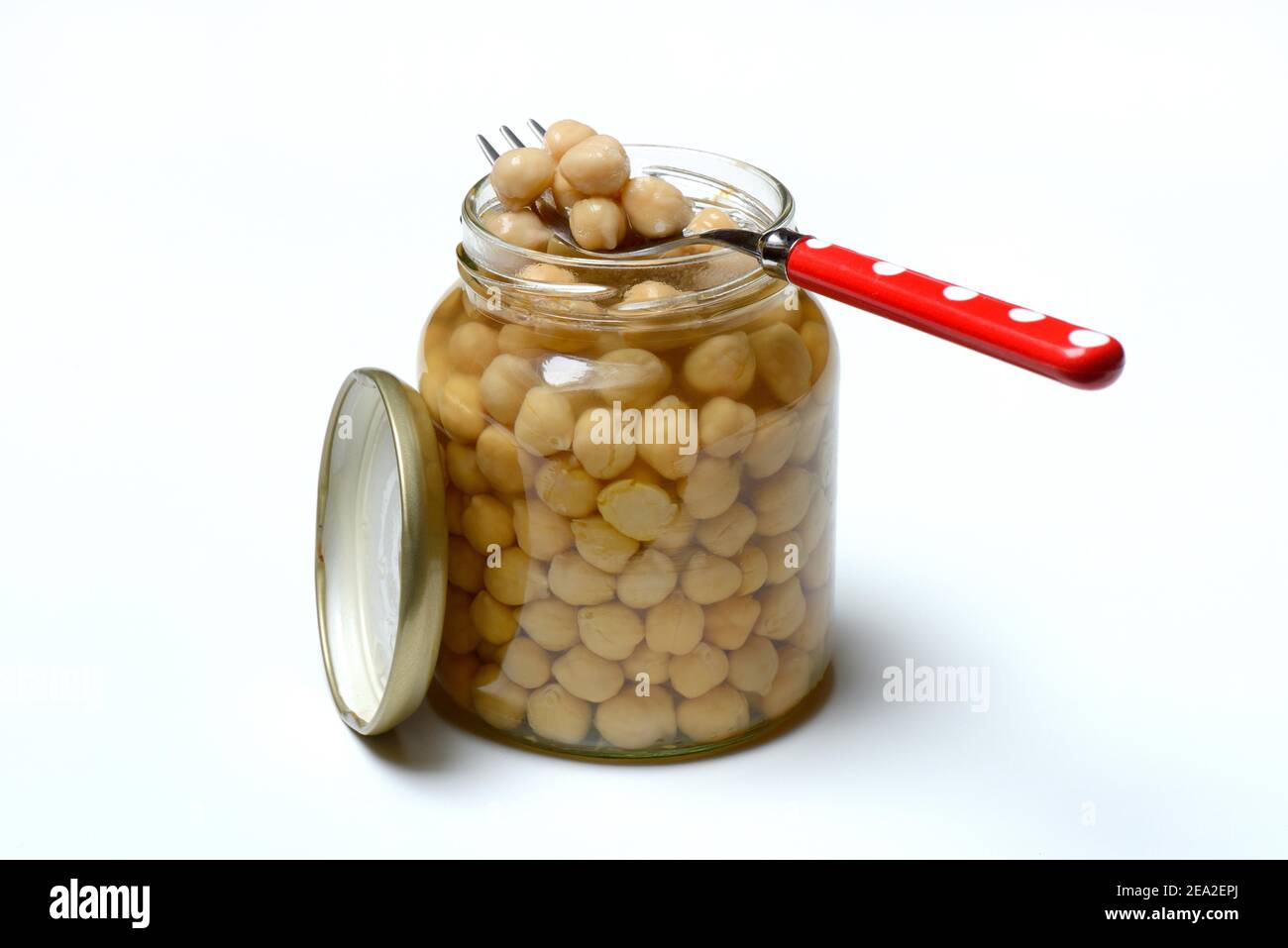 Chickpeas ( Cicer arietinum) in glass with fork Stock Photo