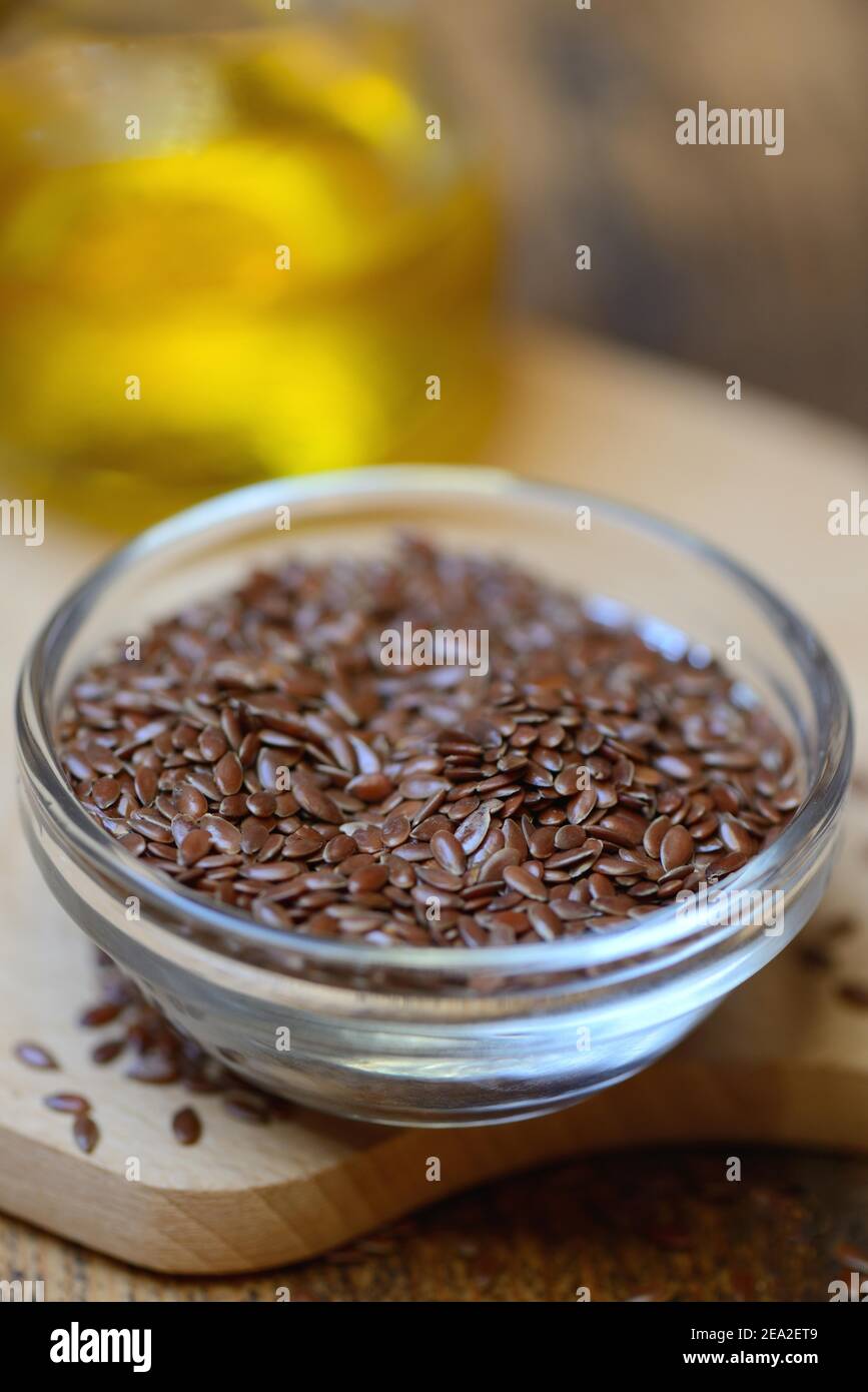 Linseed ( Linum usitatissimum) in husk and linseed oil Stock Photo Alamy